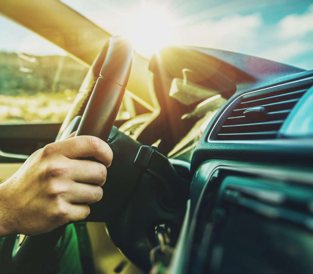 Driving a vehicle in the sun - Car Air Conditioning London Borough of Hackney